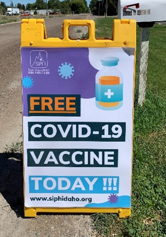 A sign on the side of a road saying Free Covid-19 vaccine today!!!